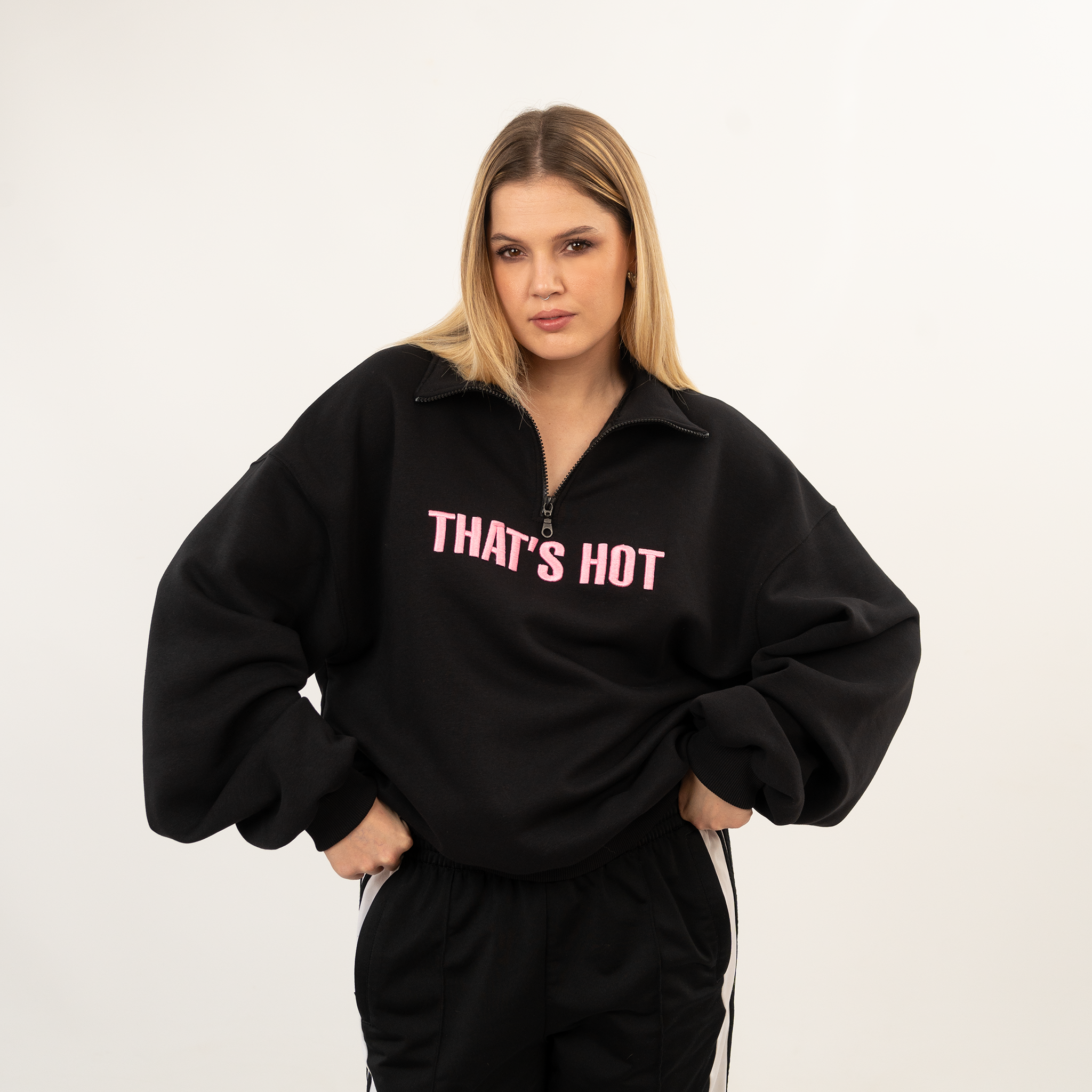 That's Hot black, half-zip sweatshirt