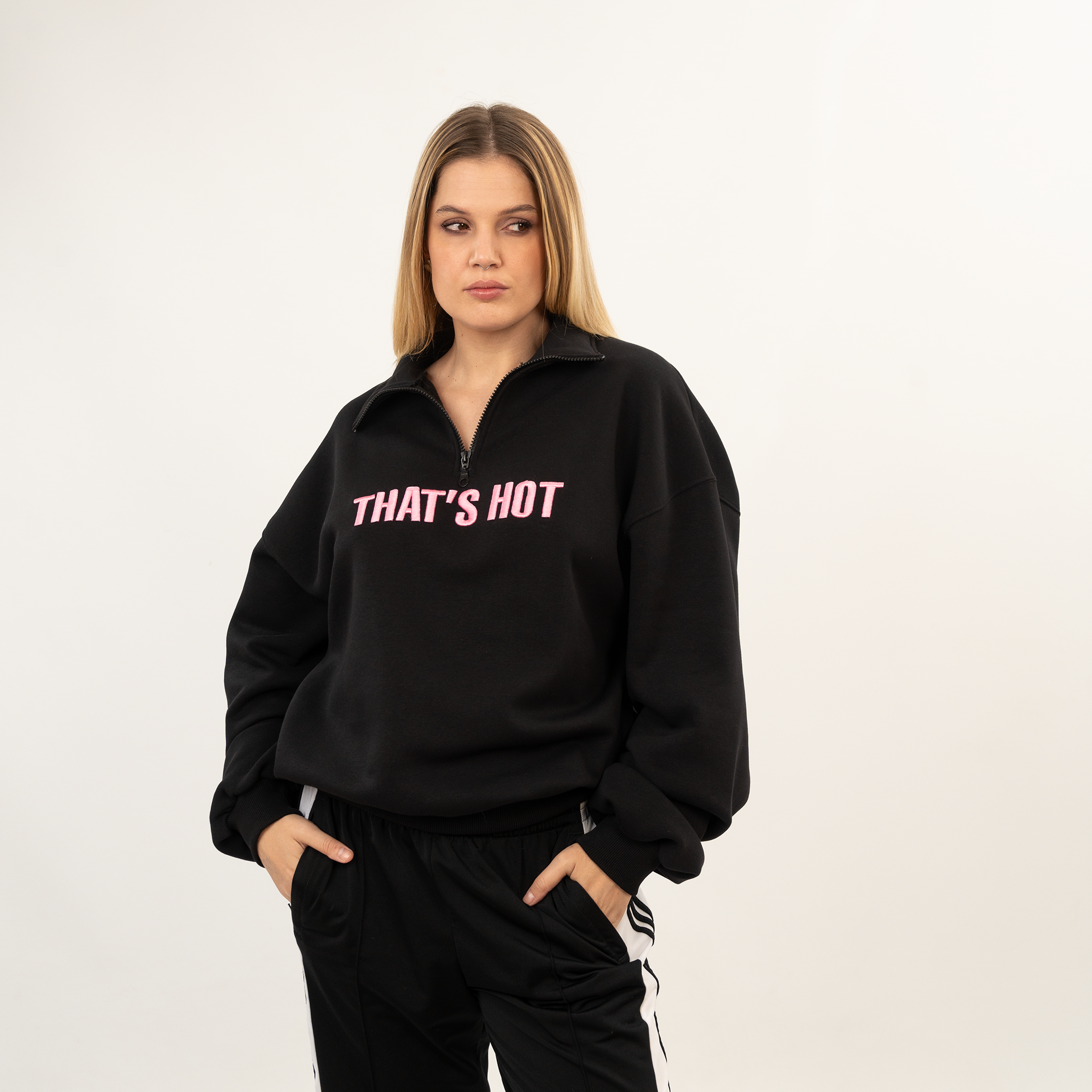 That's Hot black, half-zip sweatshirt