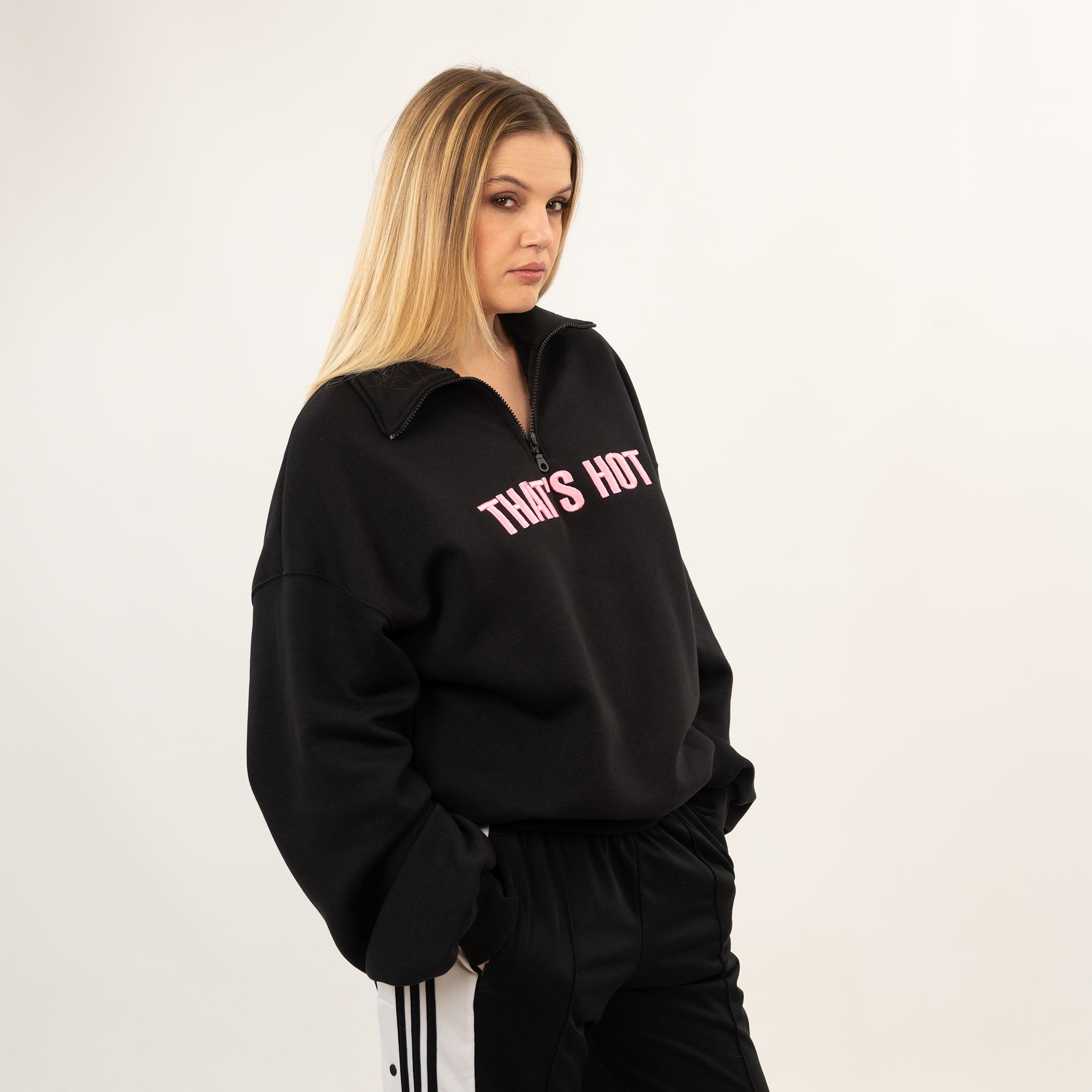 That's Hot black, half-zip sweatshirt