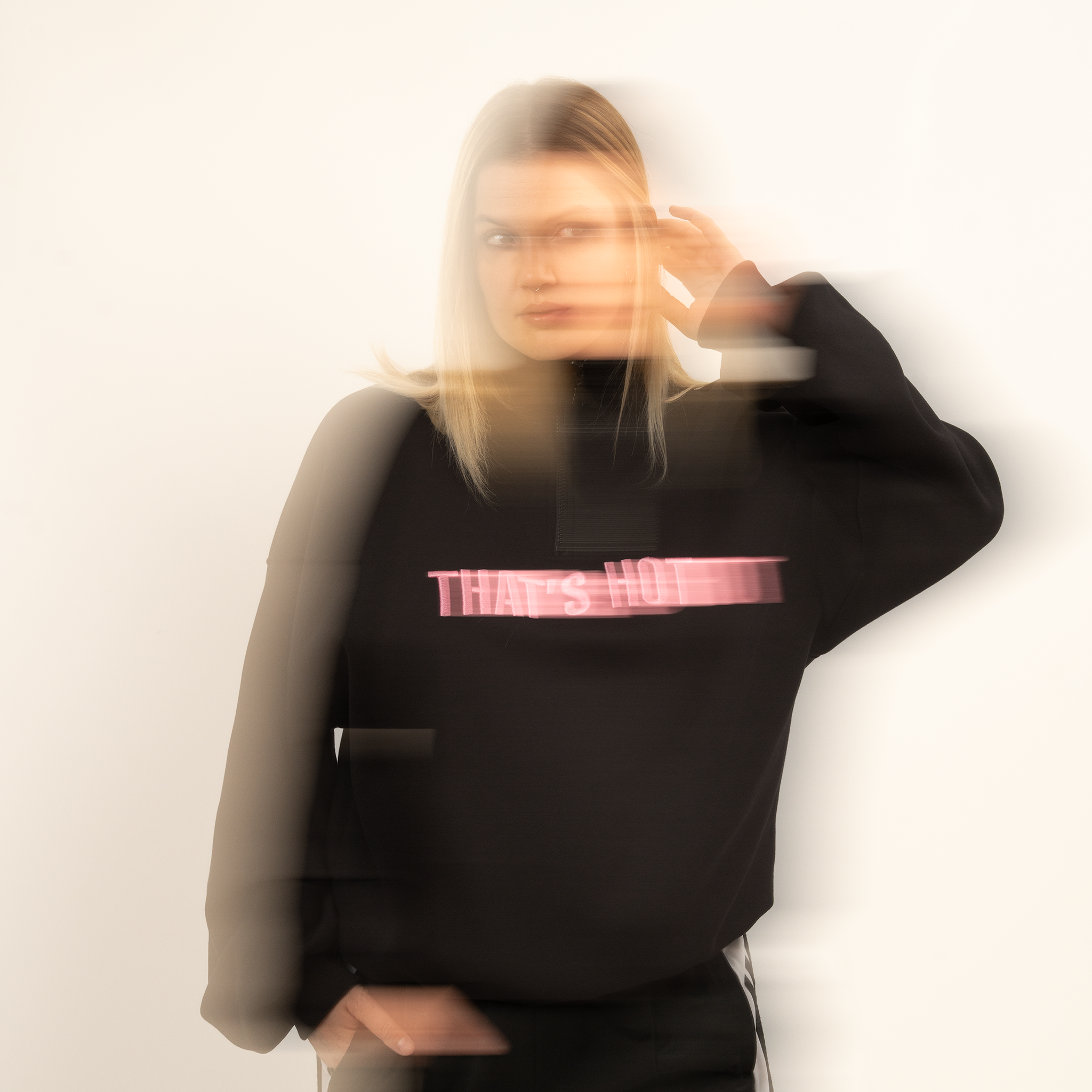 That's Hot black, half-zip sweatshirt