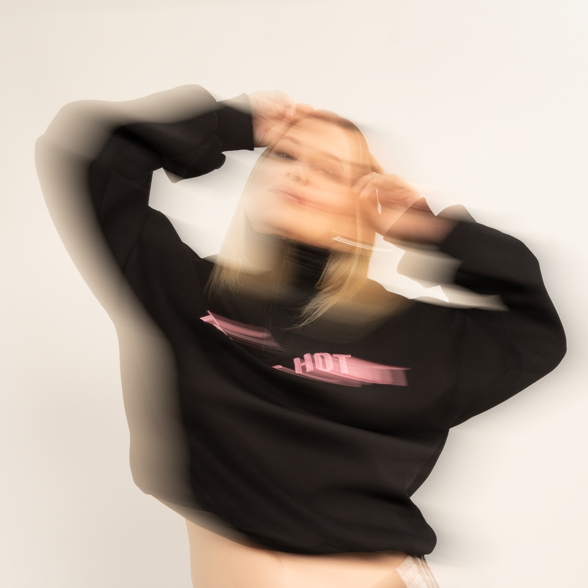 That's Hot black, half-zip sweatshirt