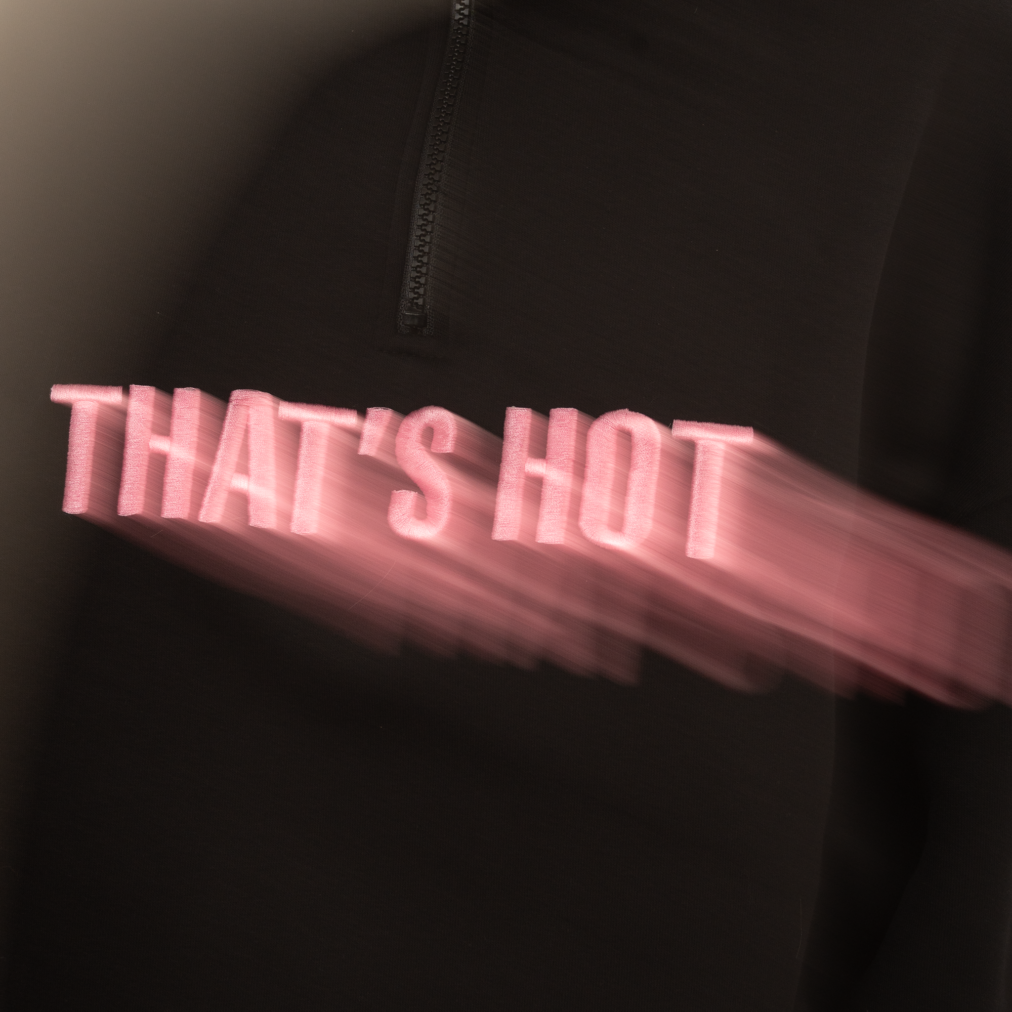 That's Hot black, half-zip sweatshirt